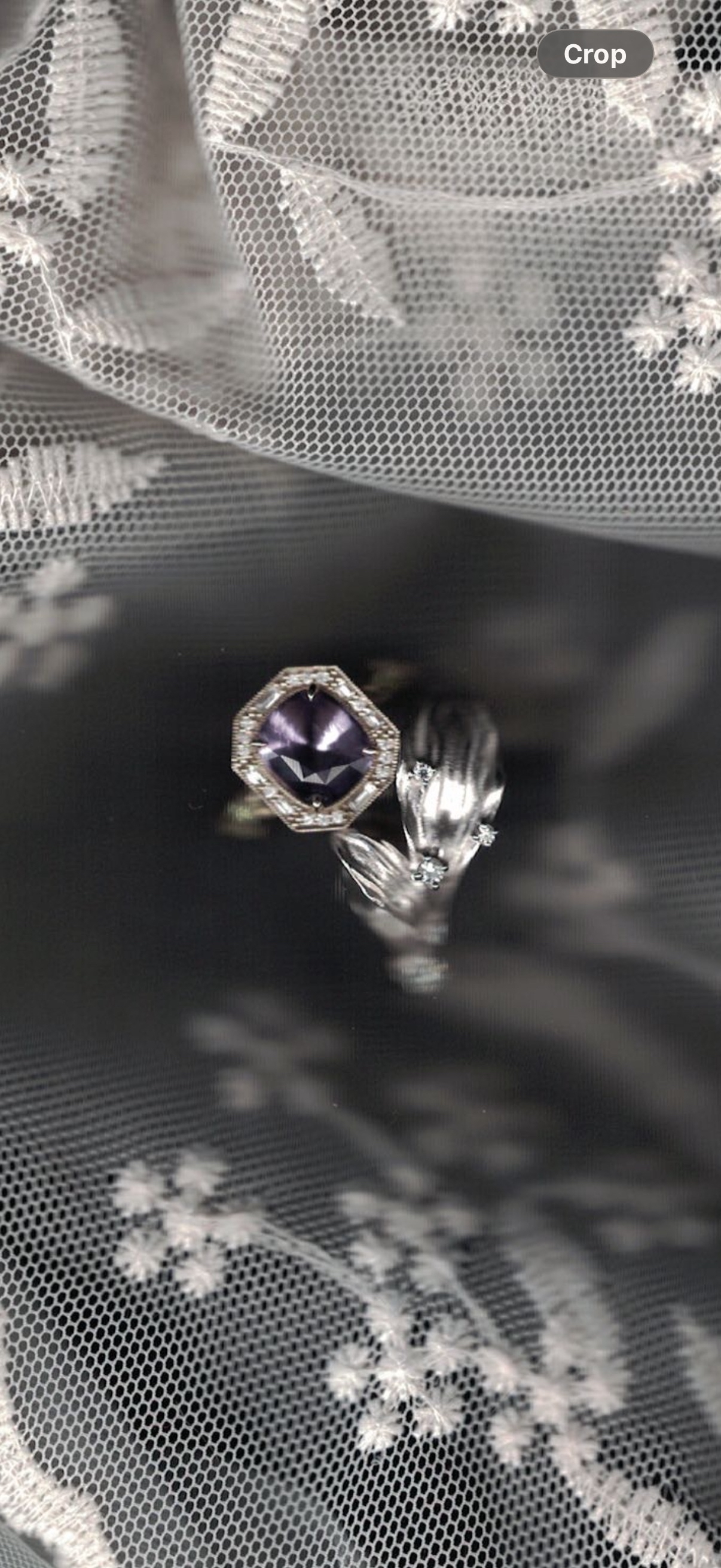Engagement rings on lace veil
